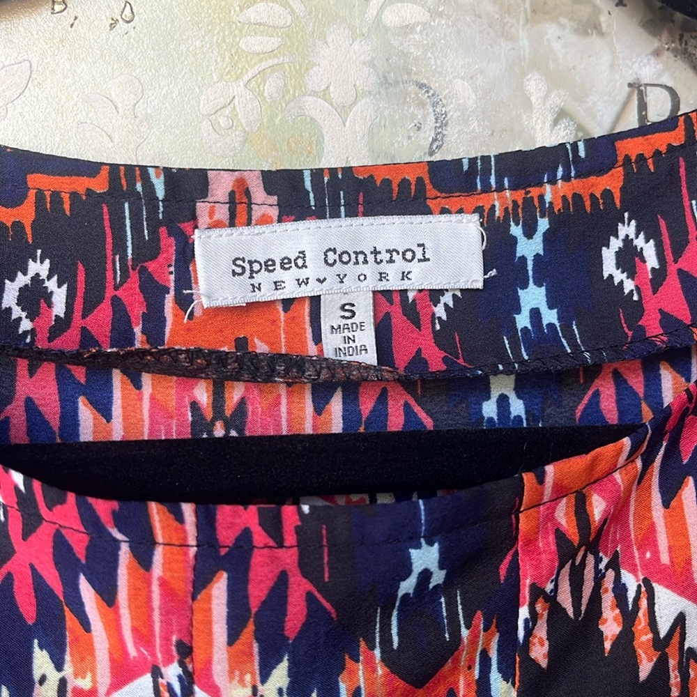 Speed Control Multi colored dress with zippered pockets